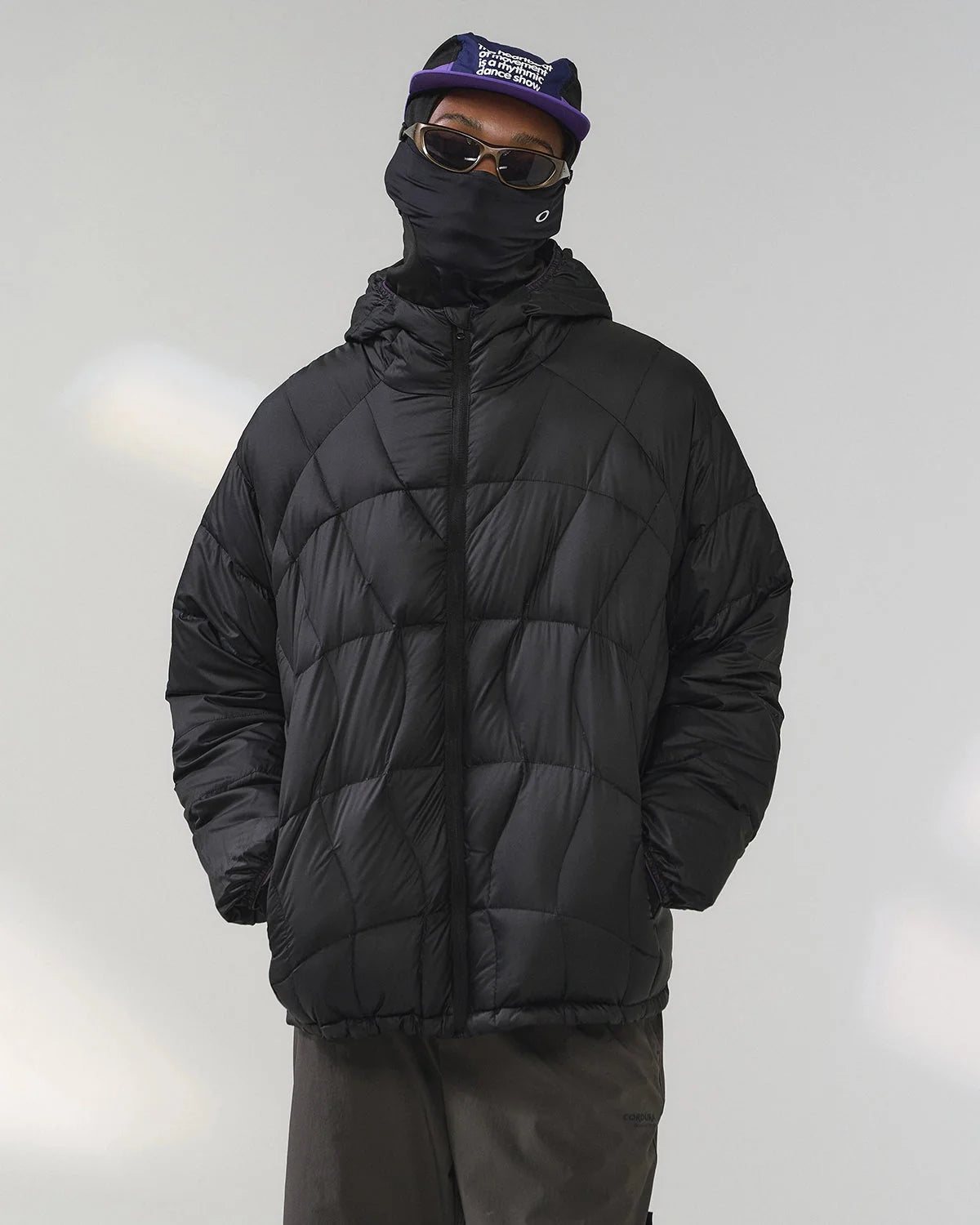Unisex hooded quilted puffer jacket with long sleeves and zip front