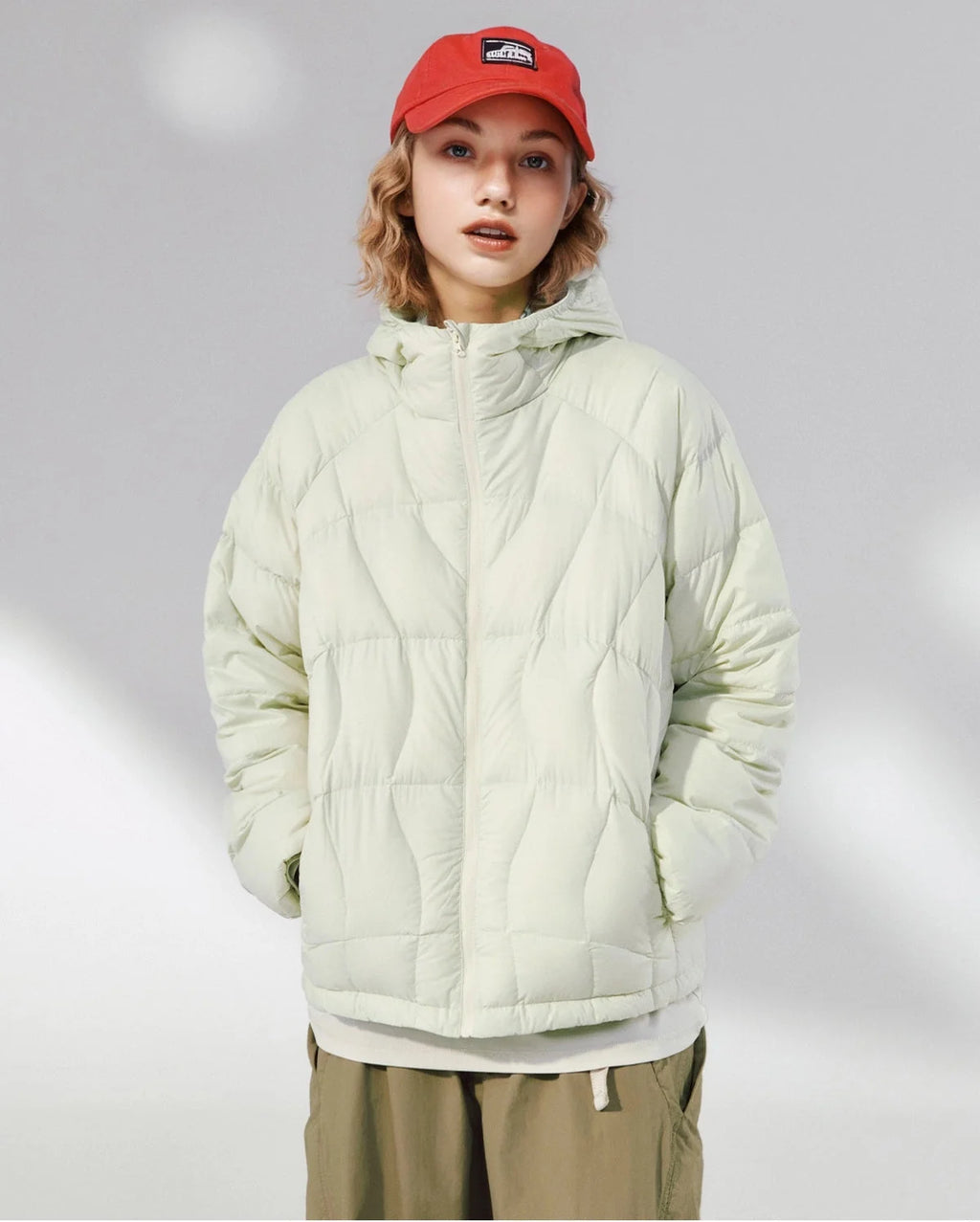 Unisex hooded quilted puffer jacket with long sleeves and zip front