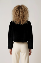 Women's cropped textured jacket with round neckline and long sleeves