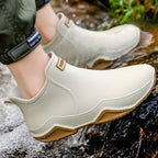 Women's slip-on ankle boots with rounded toe, pull tab and flat lug sole