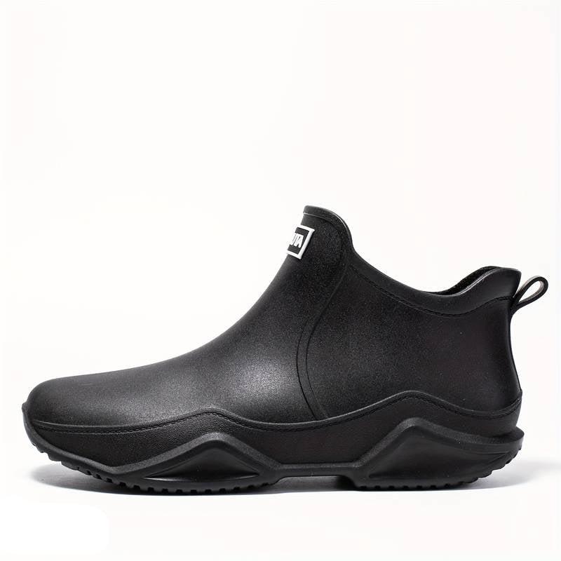 Women's slip-on ankle boots with rounded toe, pull tab and flat lug sole