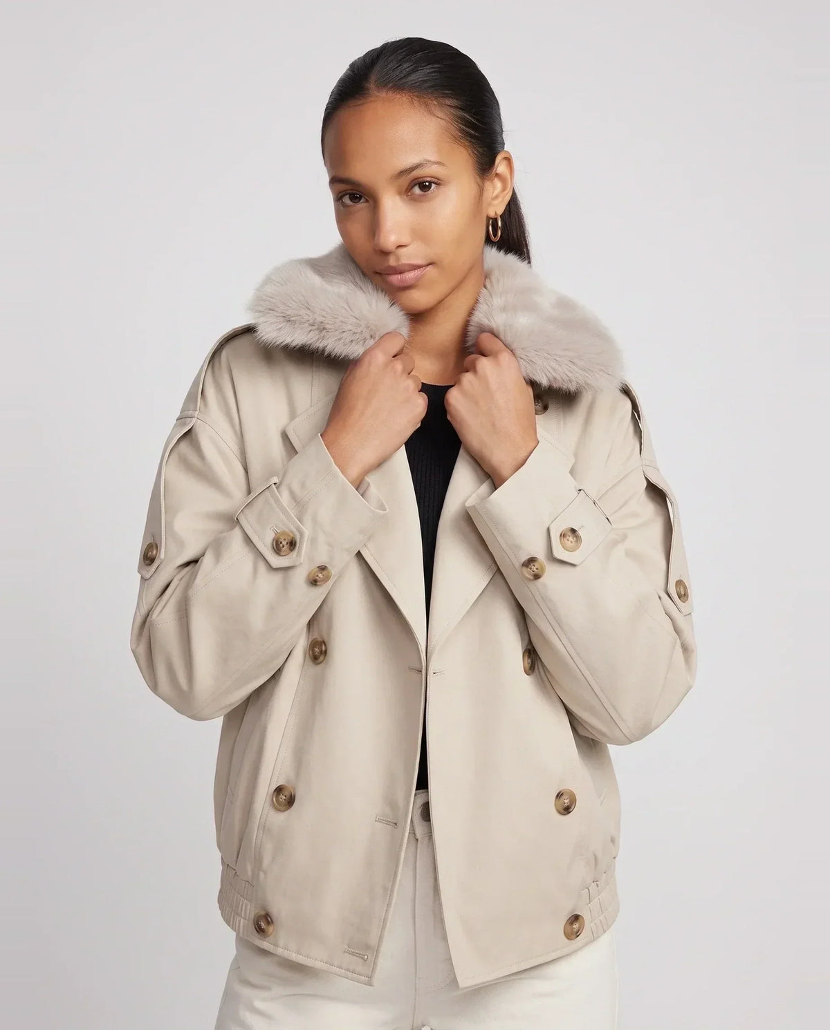Women's beige short trench jacket with faux-fur collar and button front