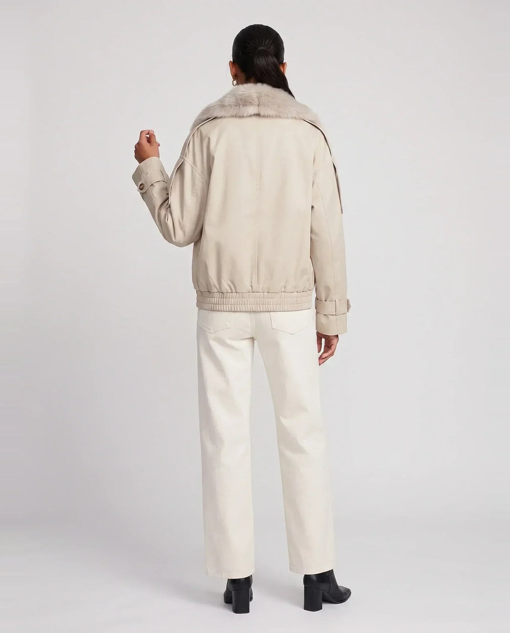 Women's beige short trench jacket with faux-fur collar and button front