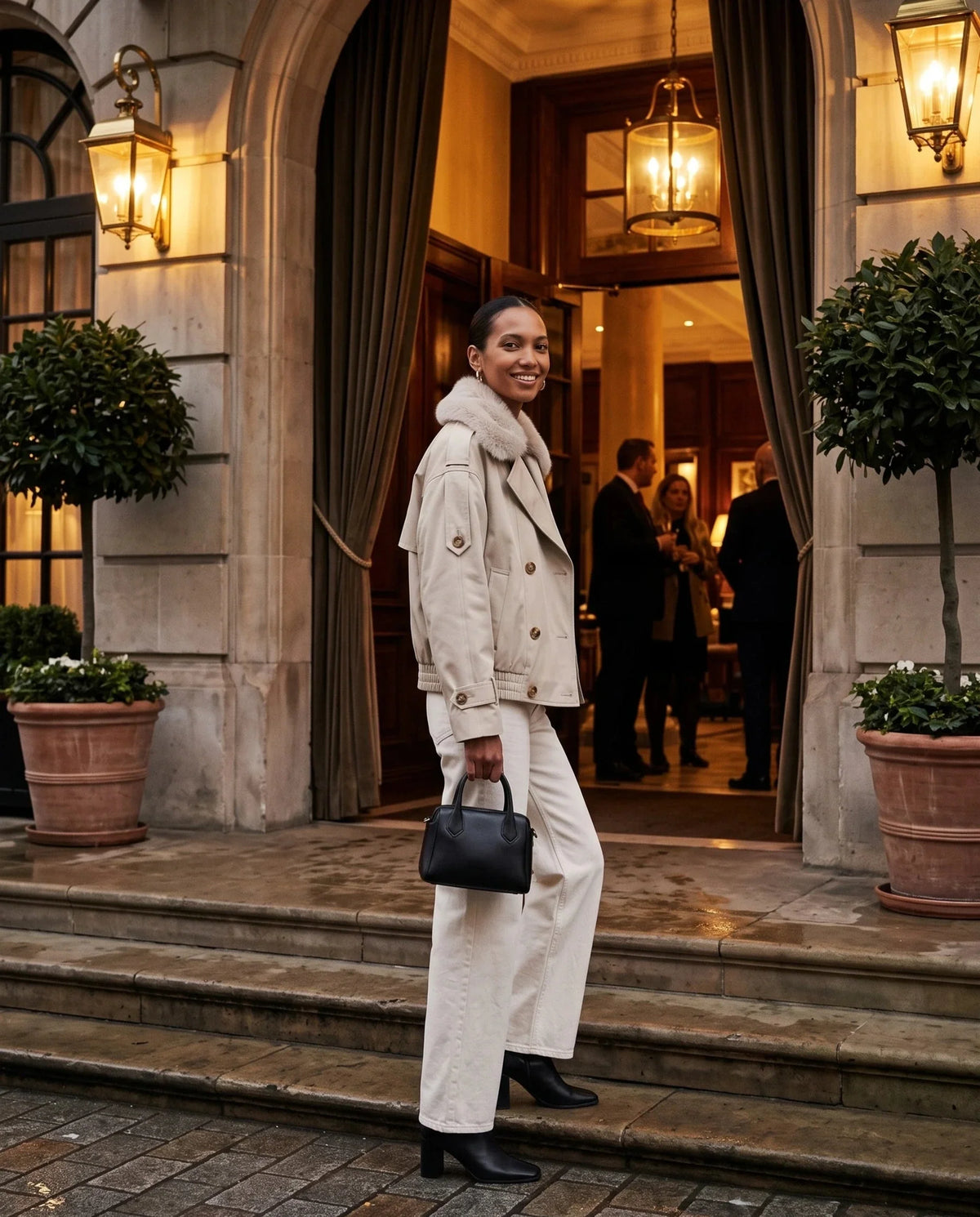Women's beige short trench jacket with faux-fur collar and button front