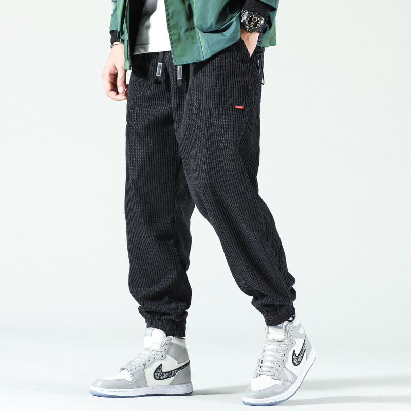 Men's corduroy jogger trousers with drawstring waist and elasticated cuffs