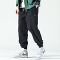 Men's corduroy jogger trousers with drawstring waist and elasticated cuffs