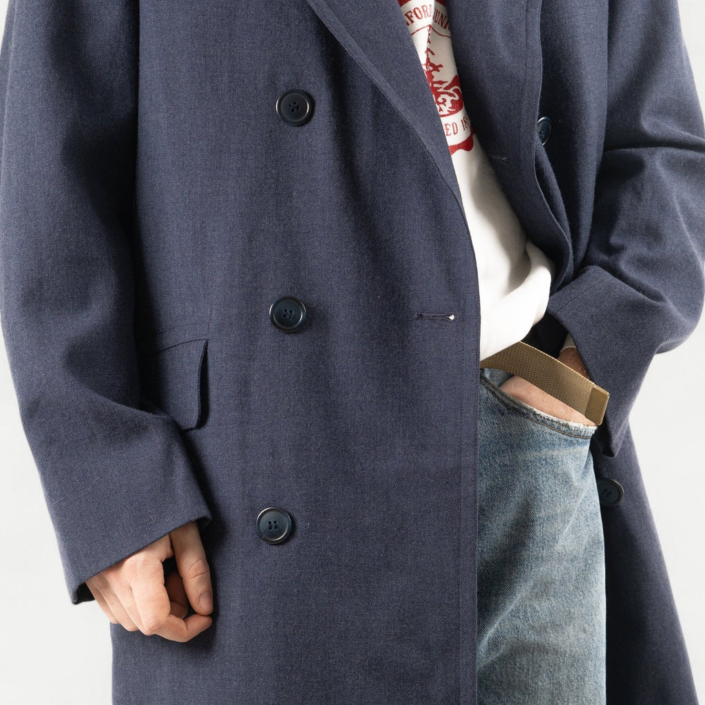 Men's navy double-breasted longline overcoat with notched lapels