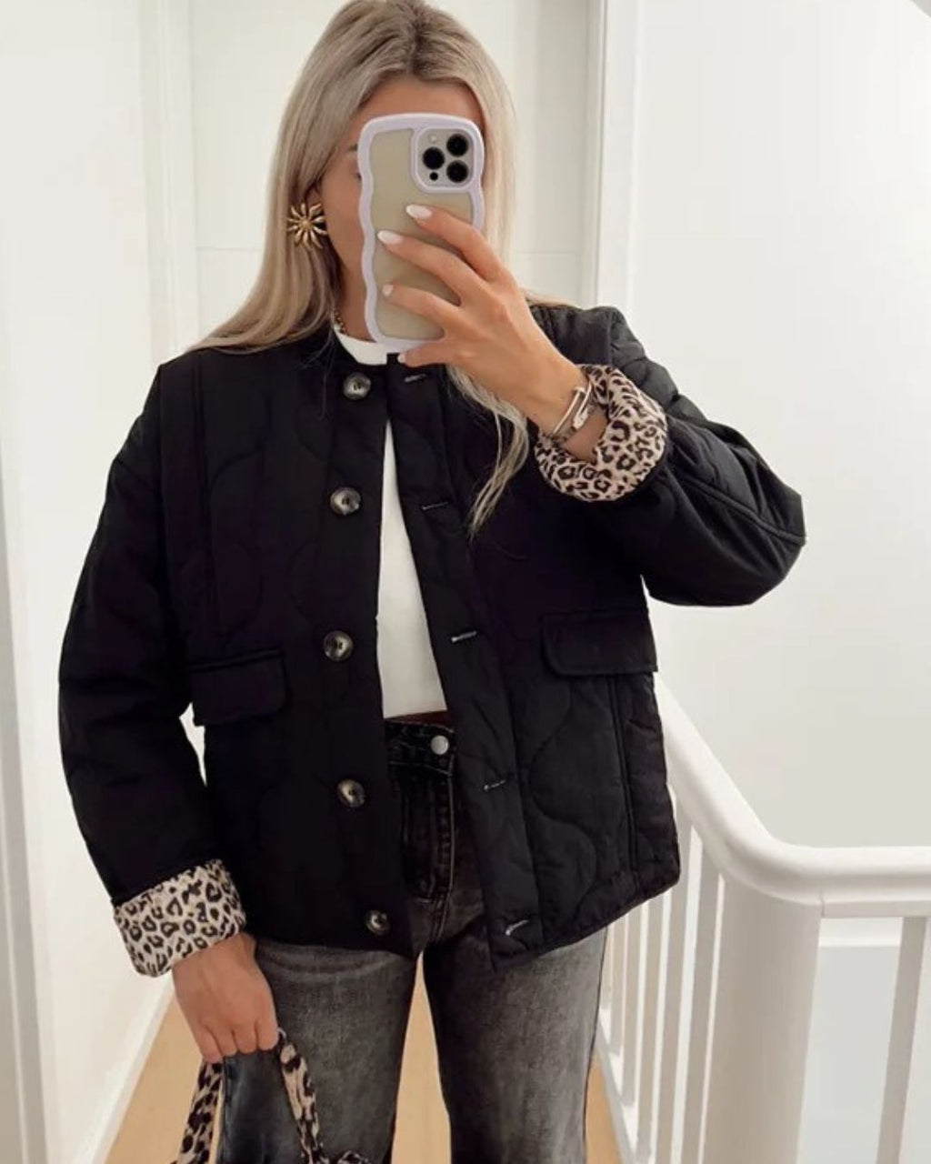 Women's quilted jacket with leopard-print cuffs, button front and flap pockets