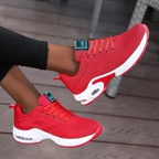 Women's lace-up trainers with textured upper, rounded toe and layered platform sole