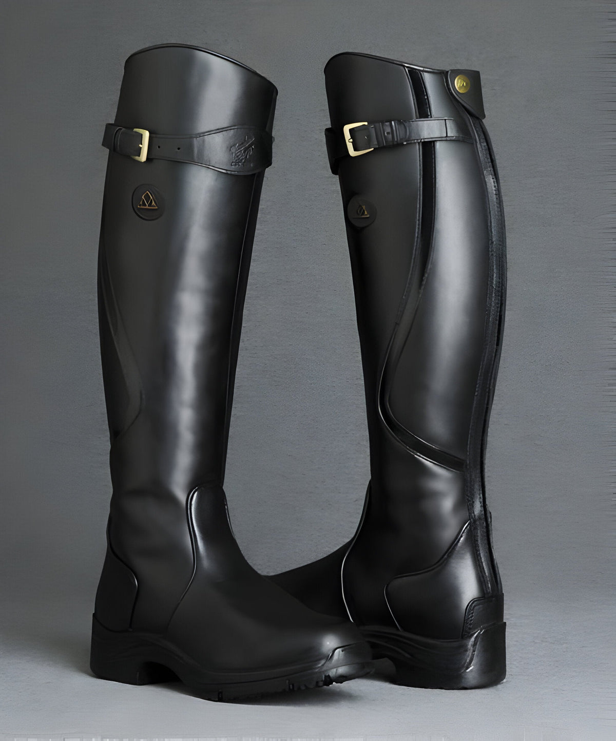 Women's tall riding boots with buckle strap, side zip and low heel