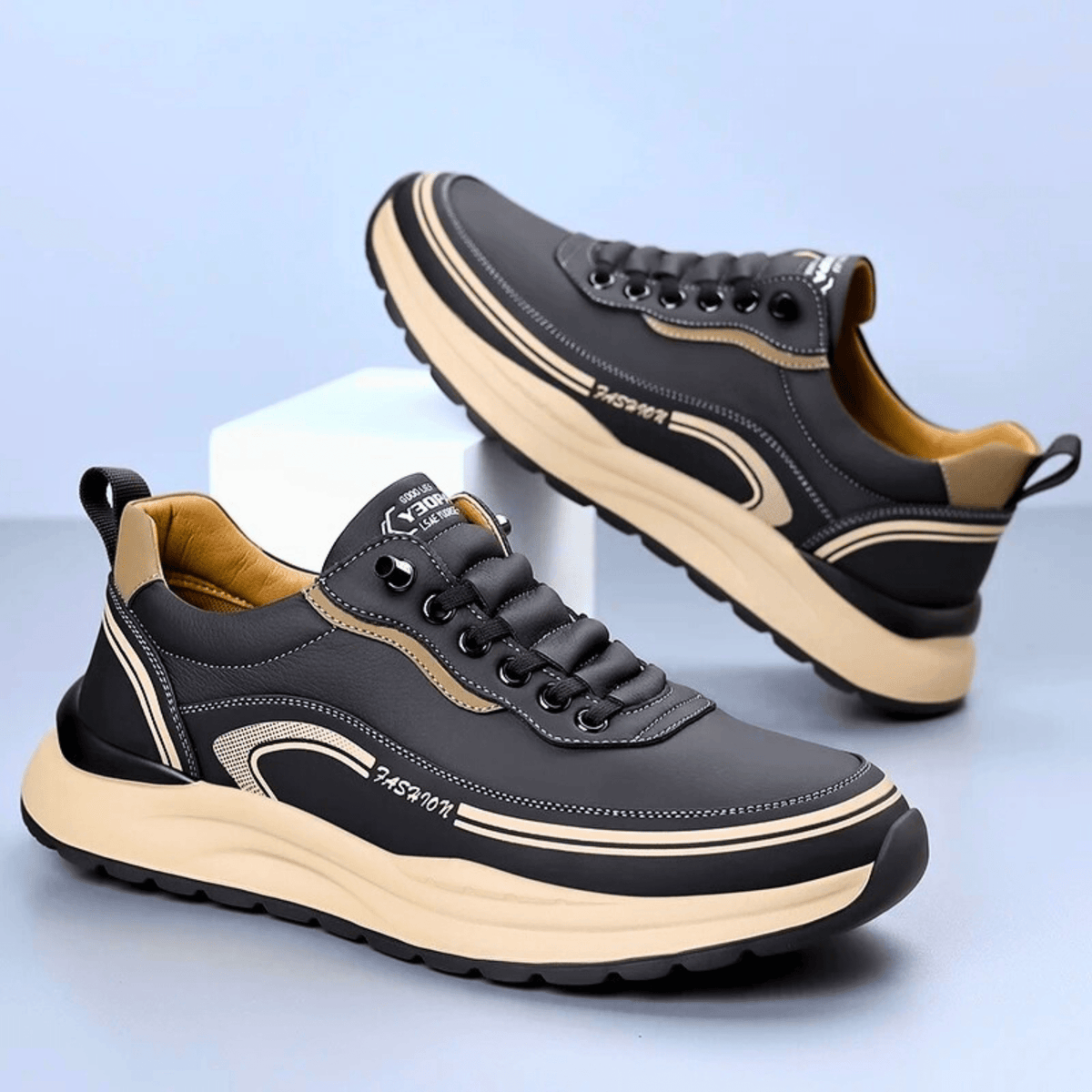 Chunky lace-up sneaker with a rounded toe, layered panels and contrast sole