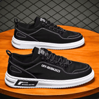Low-top lace-up sneakers with stitched panels and contrast soles