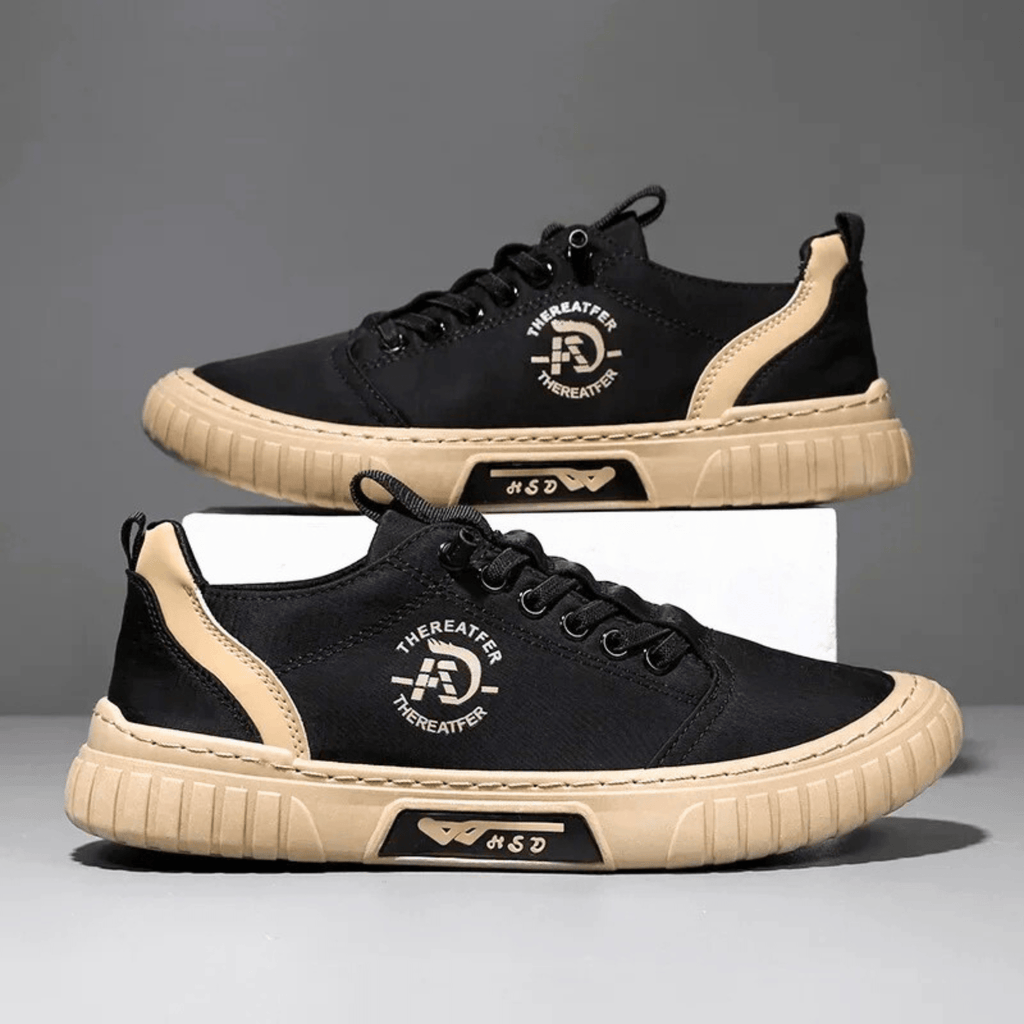 Low-top lace-up casual trainer with stitched panels and textured flat sole