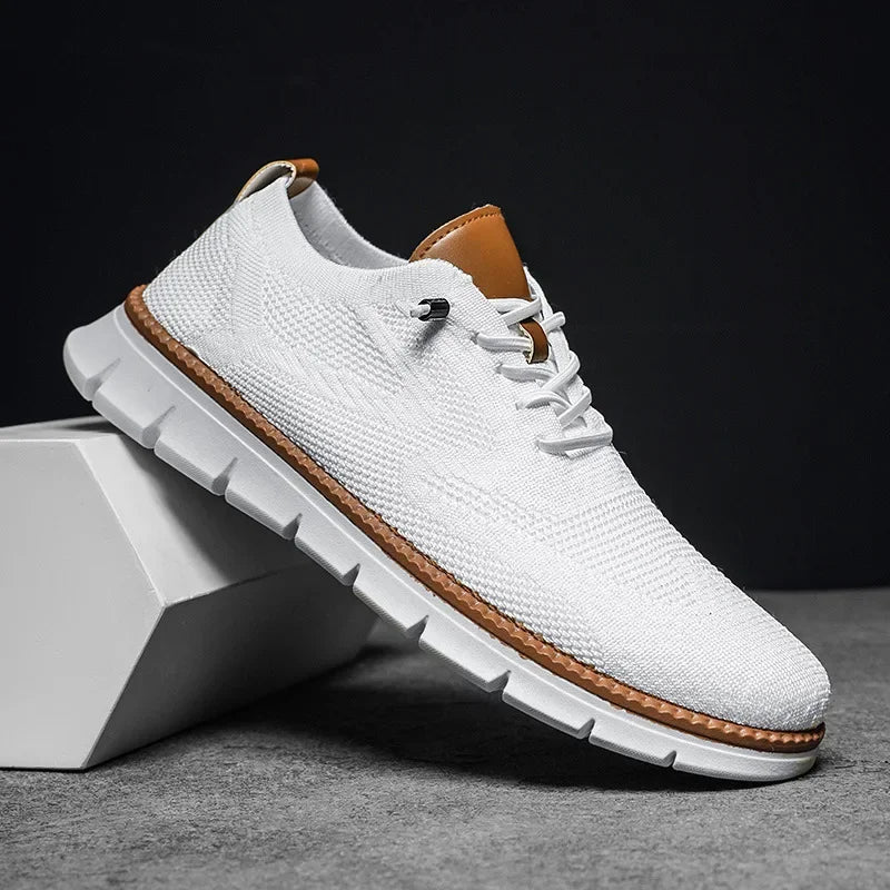 Men's low-top lace-up trainers with textured upper and white ridged sole