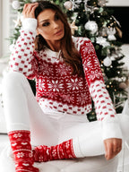 Women's red and white Fair Isle Christmas jumper with reindeer and snowflake motifs