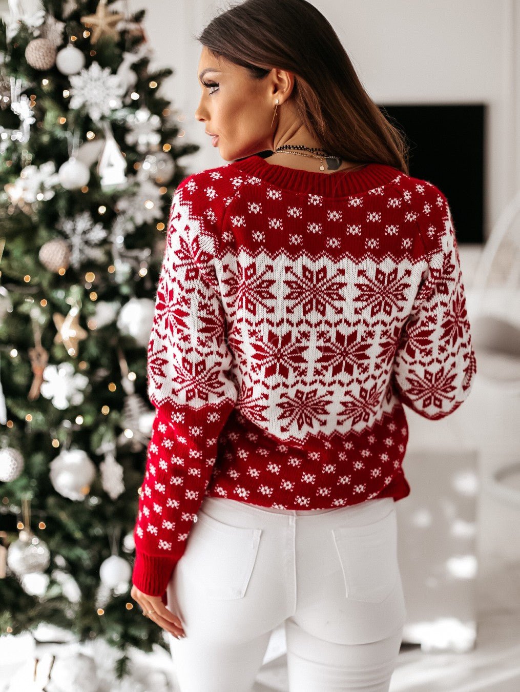 Women's red and white Fair Isle Christmas jumper with reindeer and snowflake motifs