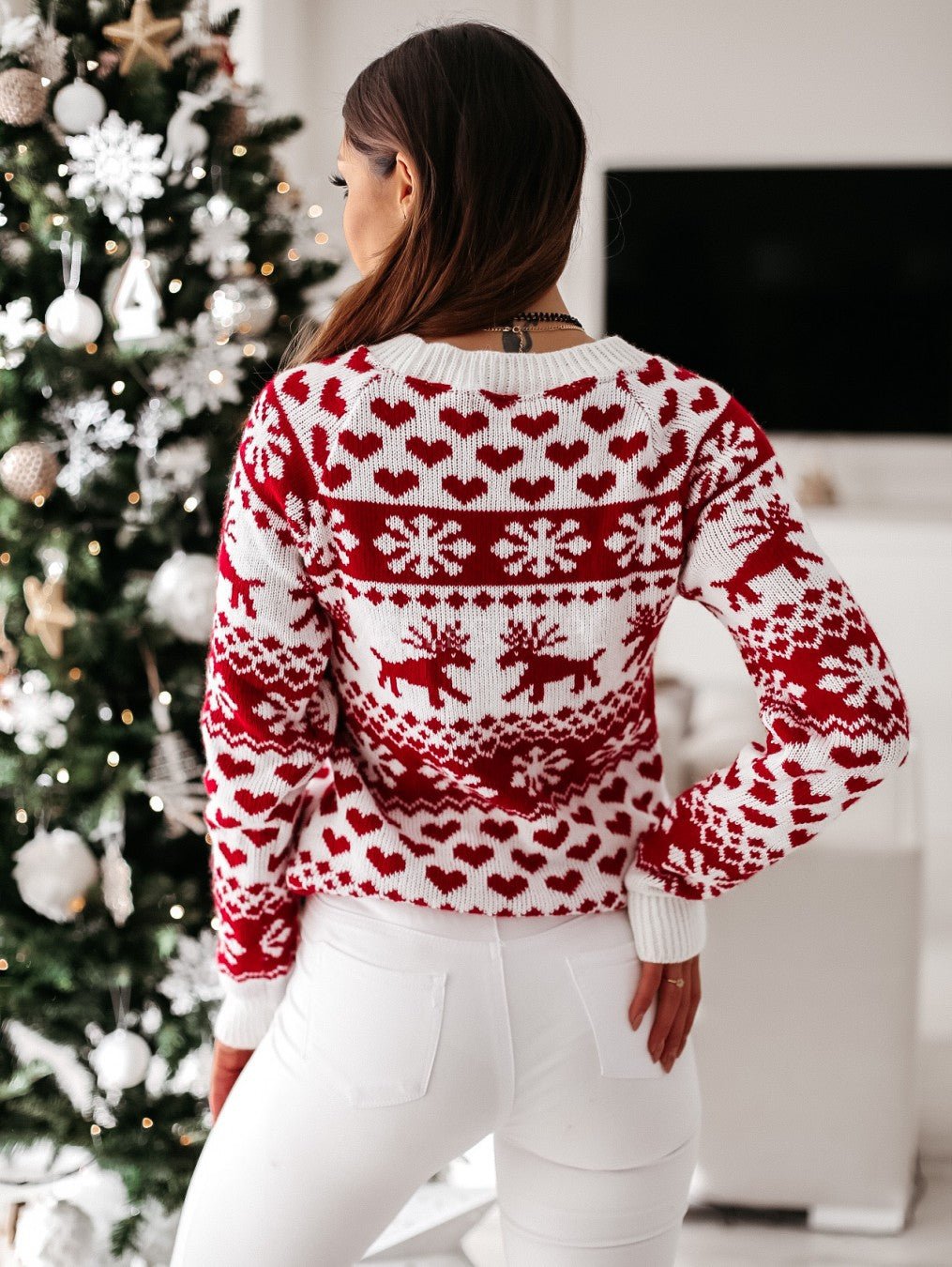 Women's red and white Fair Isle Christmas jumper with reindeer and snowflake motifs