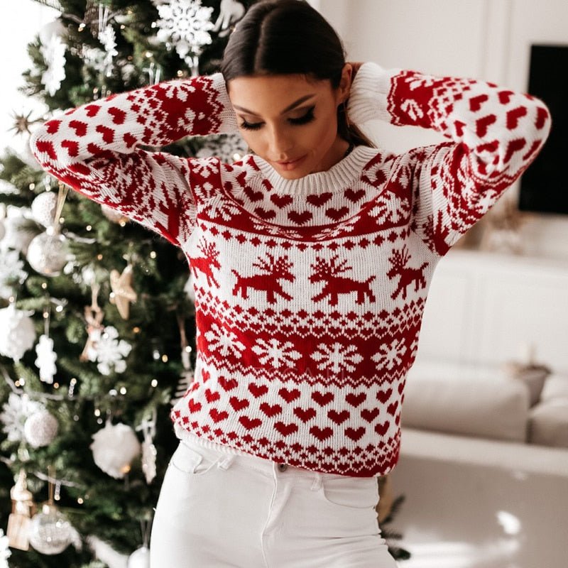 Women's red and white Fair Isle Christmas jumper with reindeer and snowflake motifs