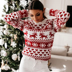 Women's red and white Fair Isle Christmas jumper with reindeer and snowflake motifs