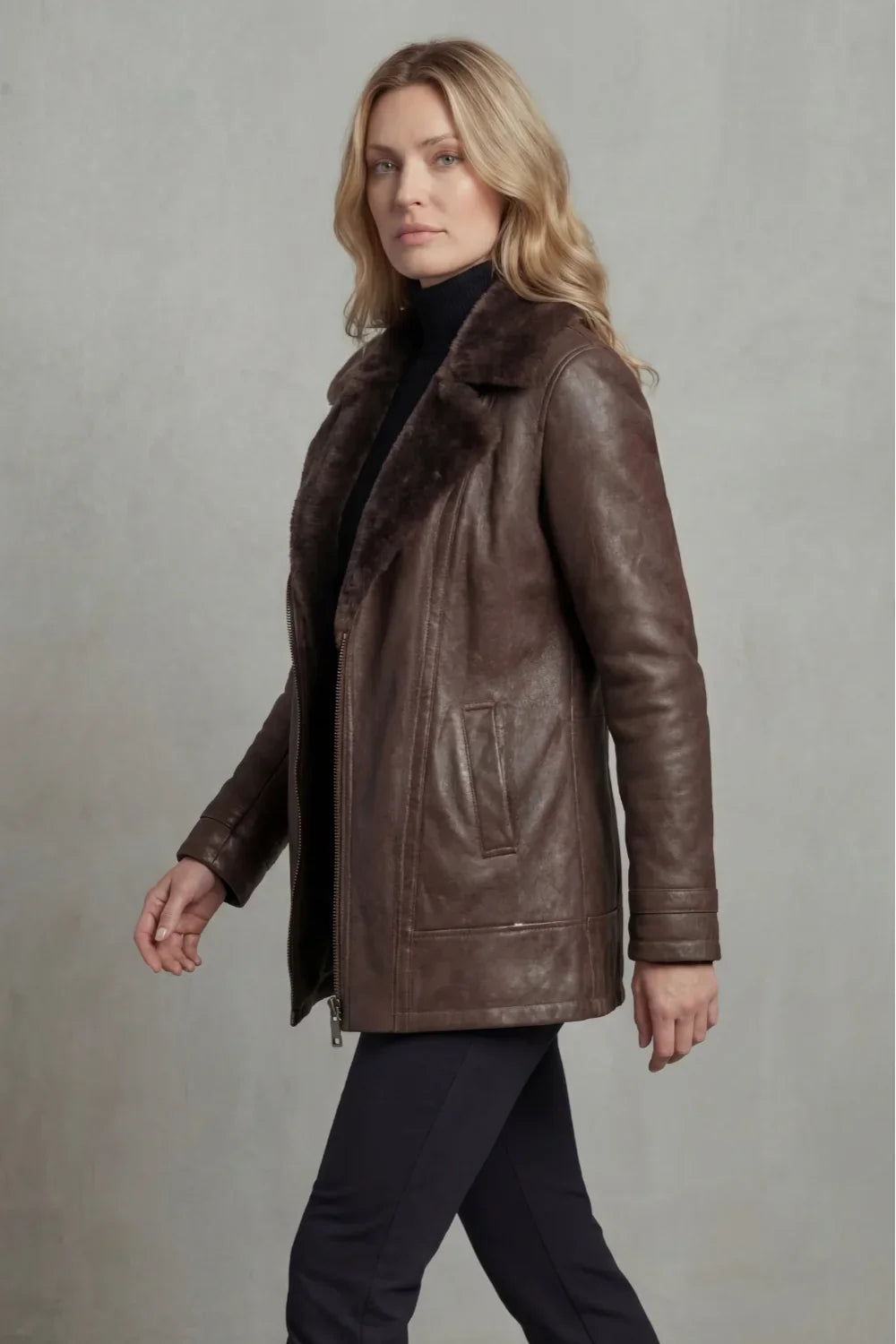 Women's brown shearling-lined jacket with plush collar and front zip