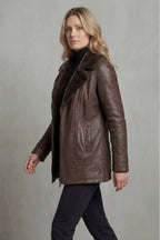 Women's brown shearling-lined jacket with plush collar and front zip