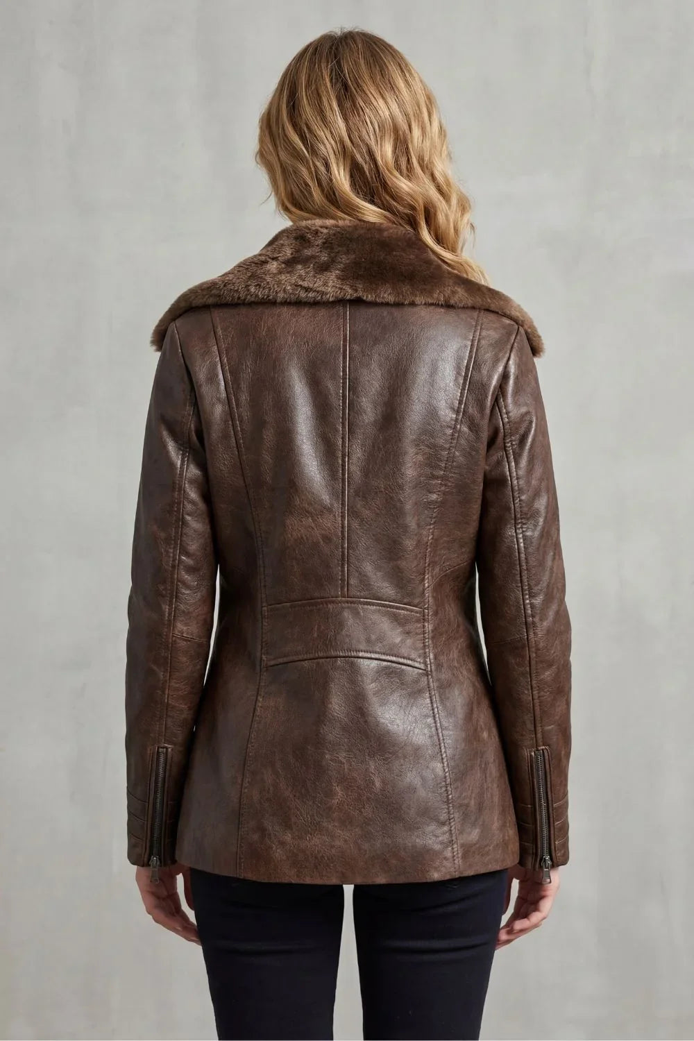 Women's brown shearling-lined jacket with plush collar and front zip