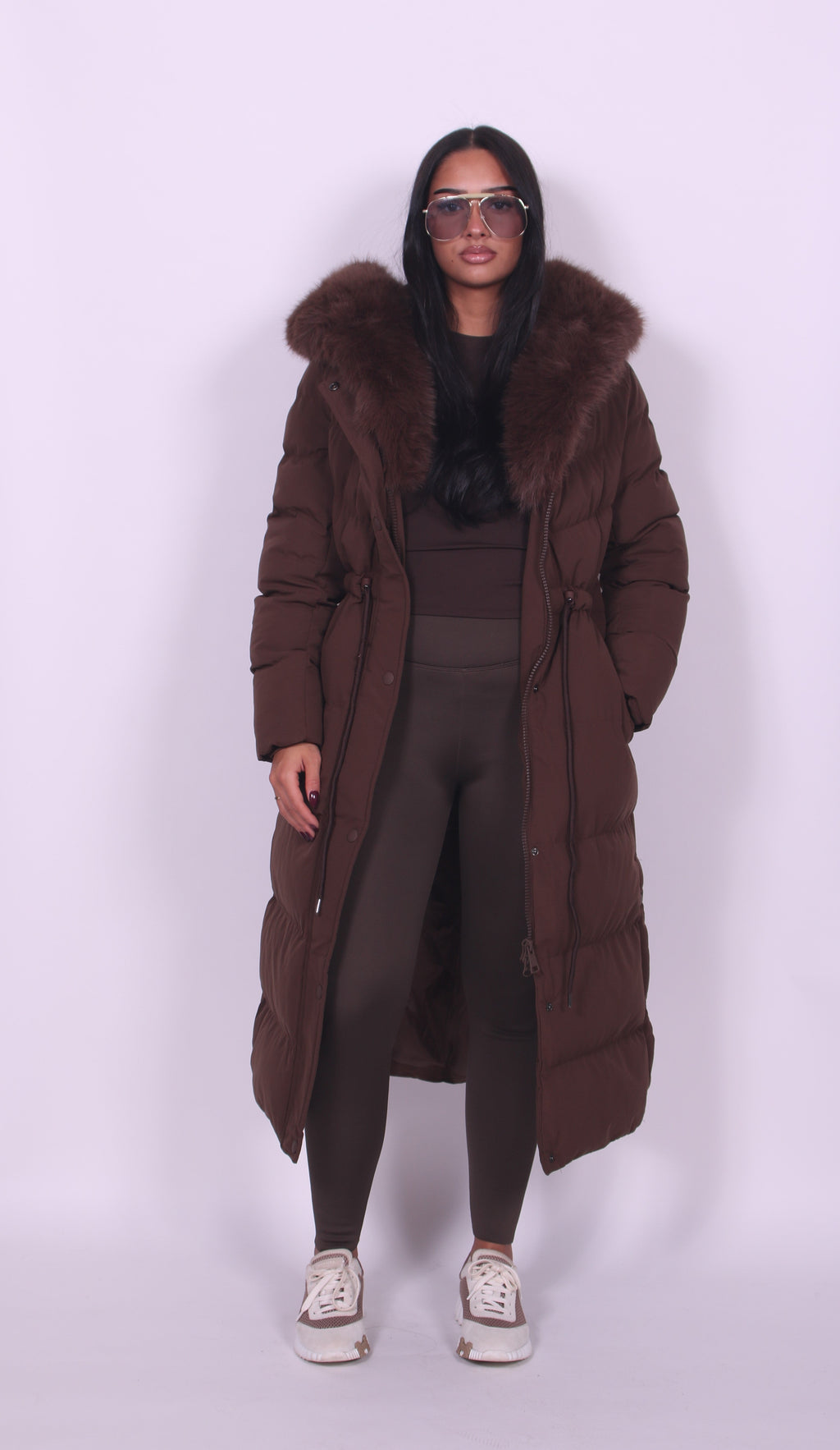 Women's longline padded coat with fur-effect hood trim and front pockets