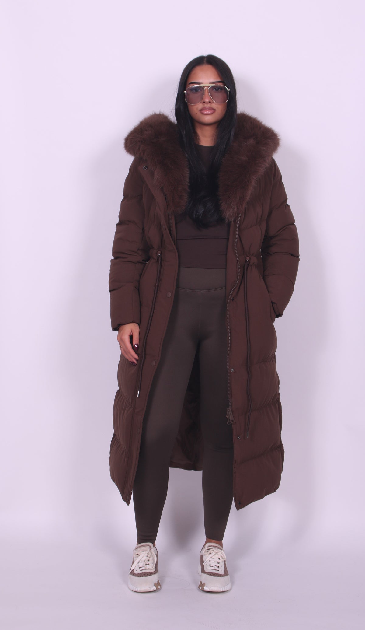 Women's longline padded coat with fur-effect hood trim and front pockets