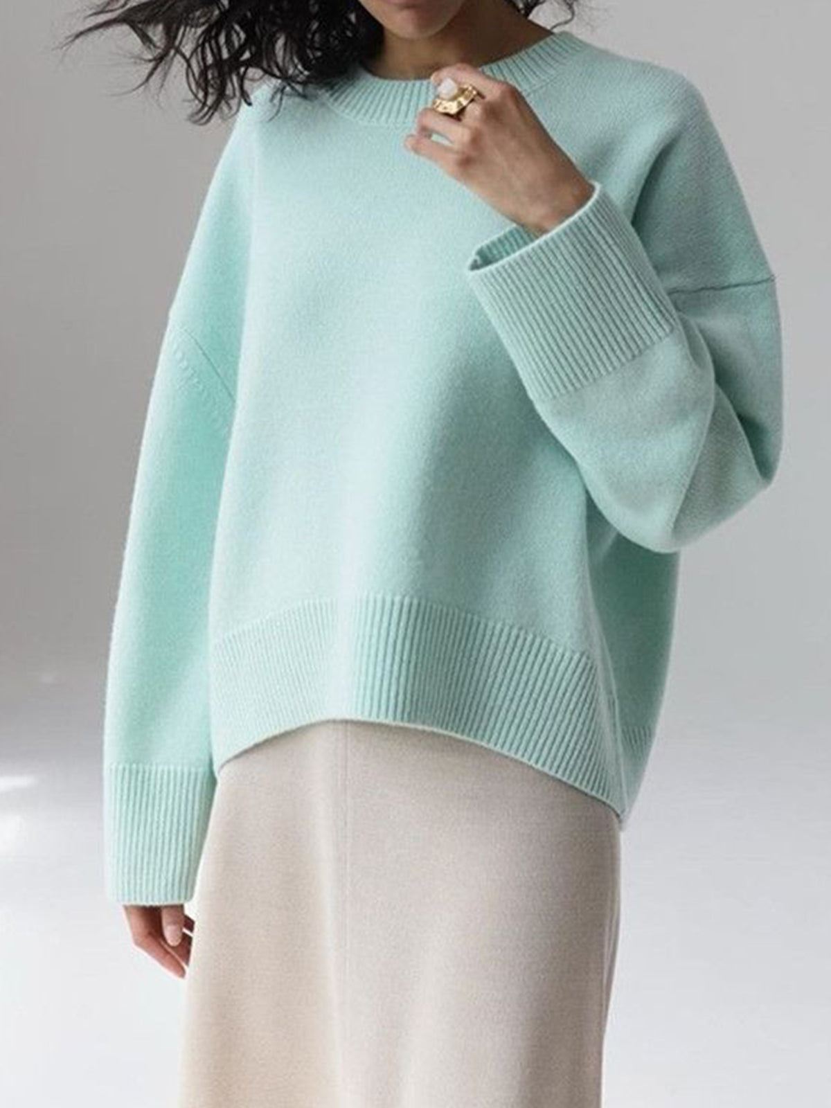Women's plain knit pullover sweater with crew neck, long sleeves and ribbed trims