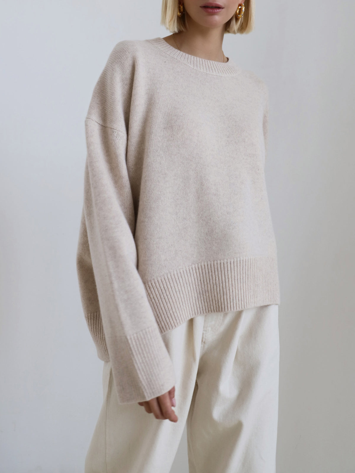 Women's plain knit pullover sweater with crew neck, long sleeves and ribbed trims