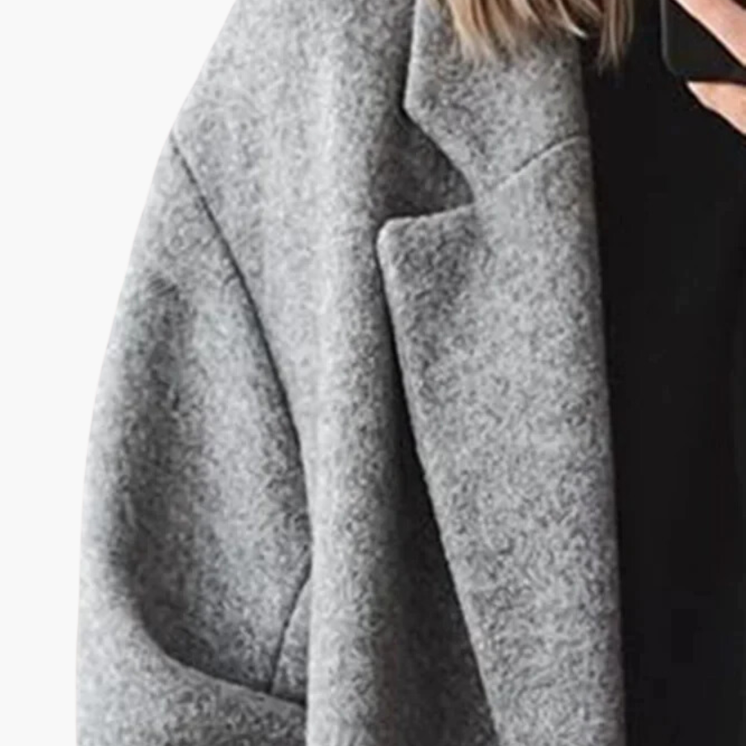 Women's longline coat with notched lapel collar, long sleeves, buttons and side pockets