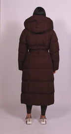 Women's longline quilted puffer coat with hood and tie waist