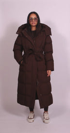 Women's longline quilted puffer coat with hood and tie waist
