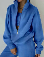 Women's cropped half-zip tracksuit set with raised collar and matching trousers