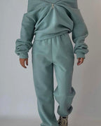 Women's cropped half-zip tracksuit set with raised collar and matching trousers