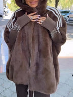 Women's oversized hooded faux fur longline coat with zip front and contrast sleeve detailing