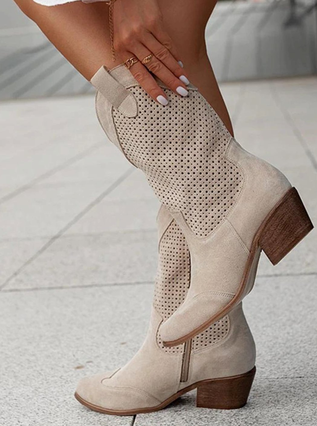 Women's perforated western boots with pointed toes and block heels