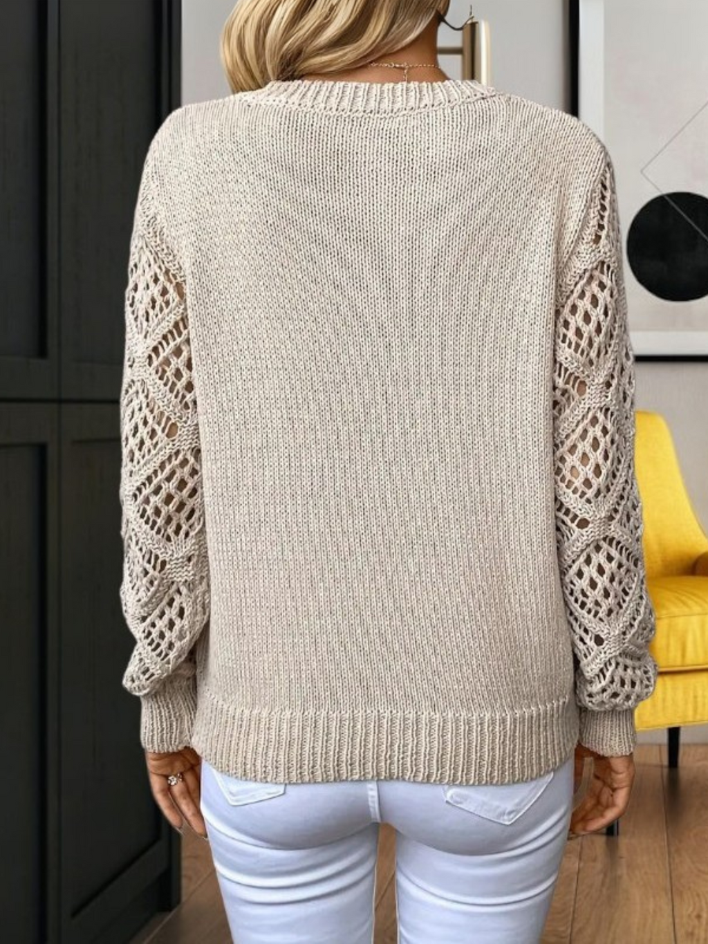 Women's V-neck jumper with long openwork sleeves
