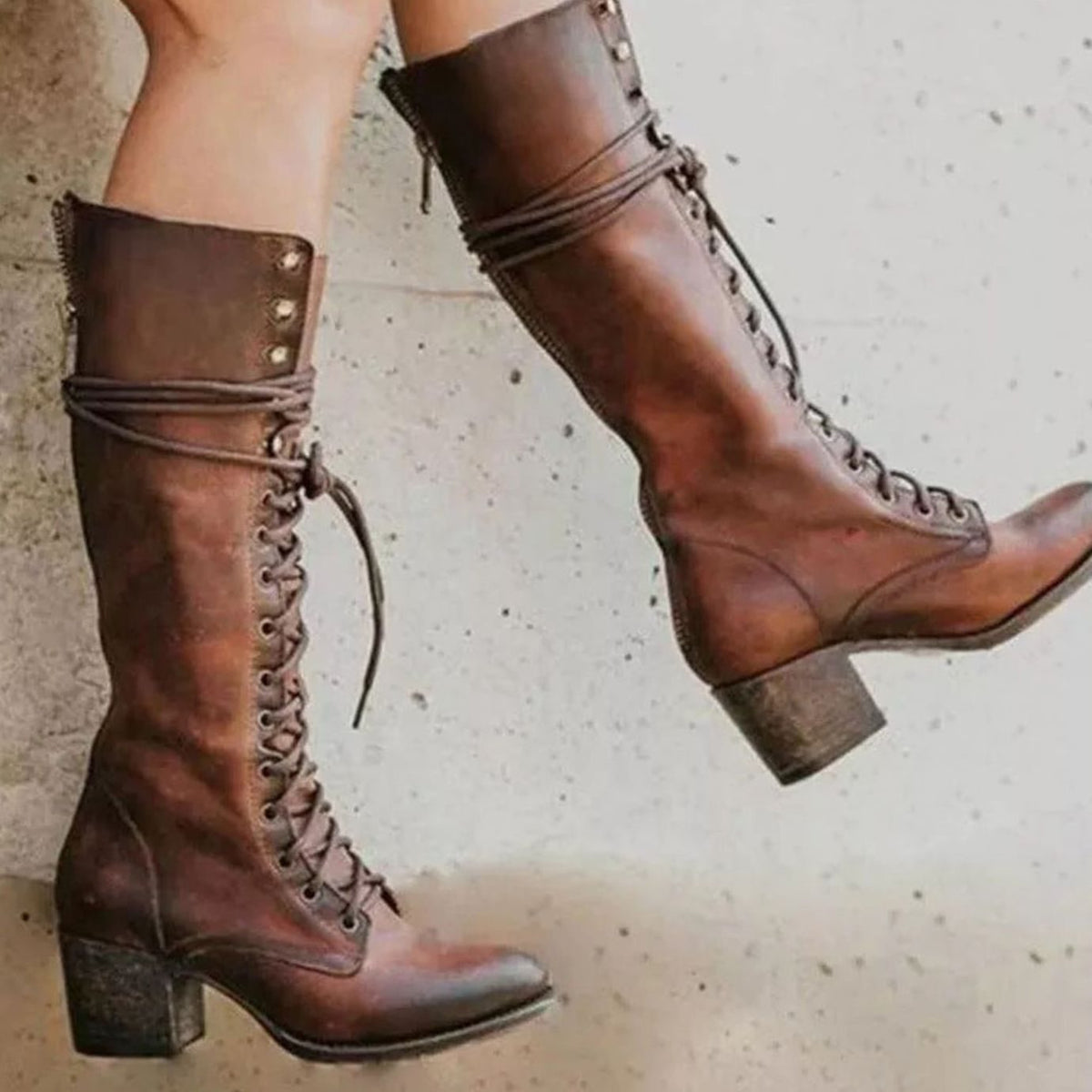 Women's knee-high lace-up boots with wraparound ankle detail and block heels