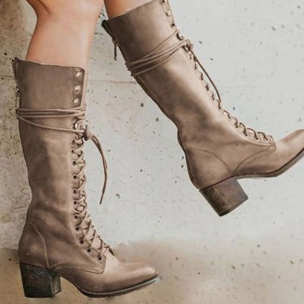 Women's knee-high lace-up boots with wraparound ankle detail and block heels
