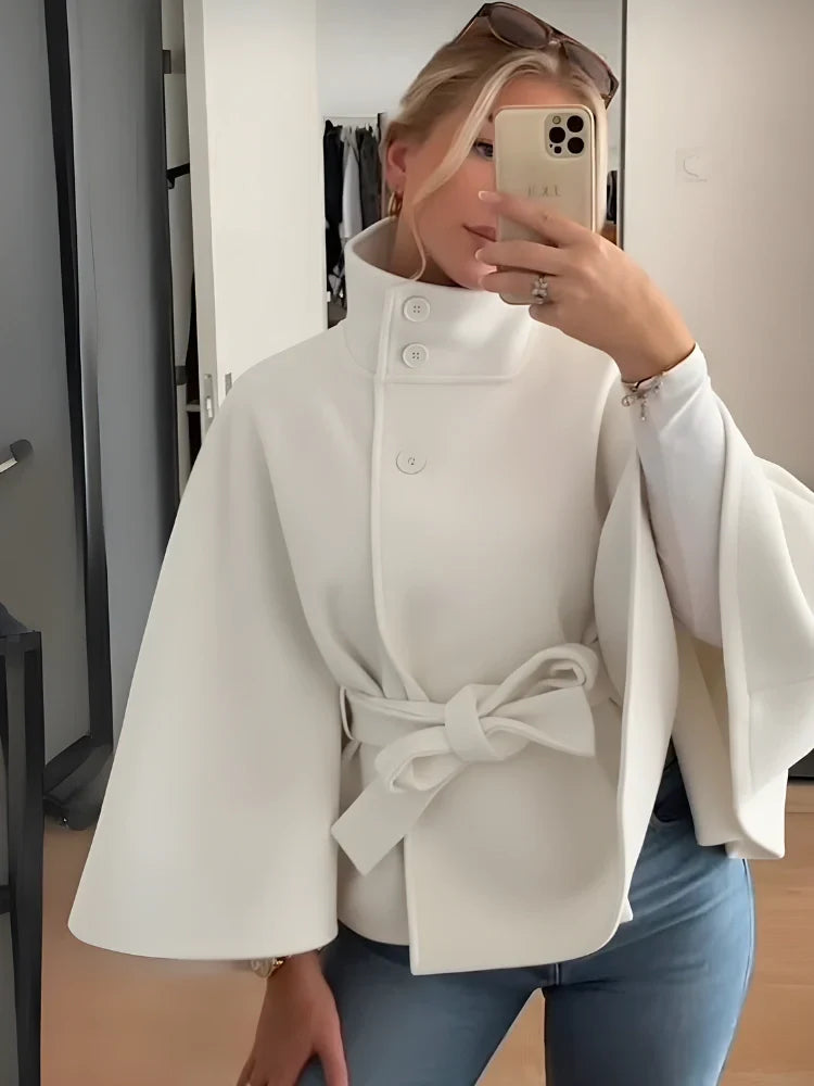 Women's belted cape coat with high collar, buttons and draped sleeves