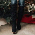 Women's high slouch boots with low heels, side zips and buckle details